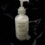 Men's shampoo glass bottle black label