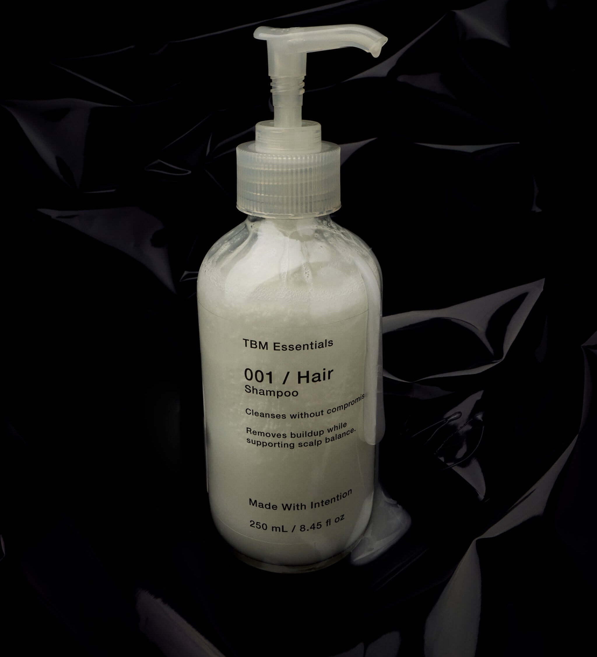 Men's shampoo glass bottle black label