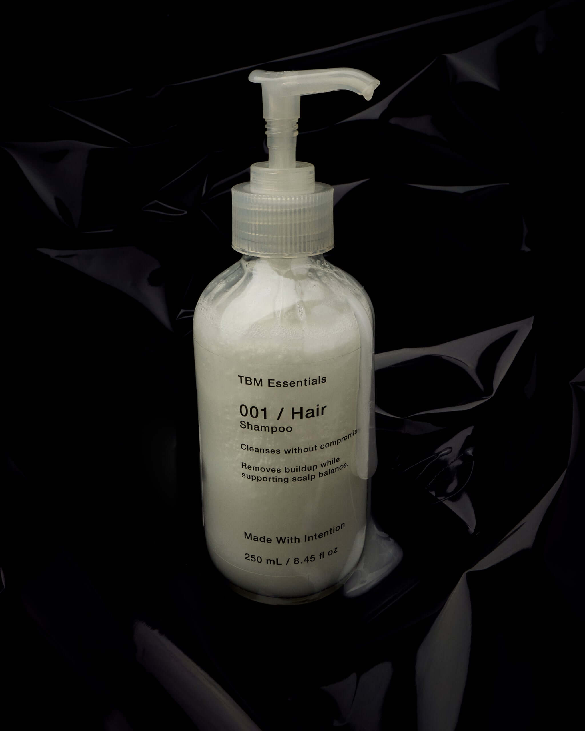 Men's shampoo glass bottle black label